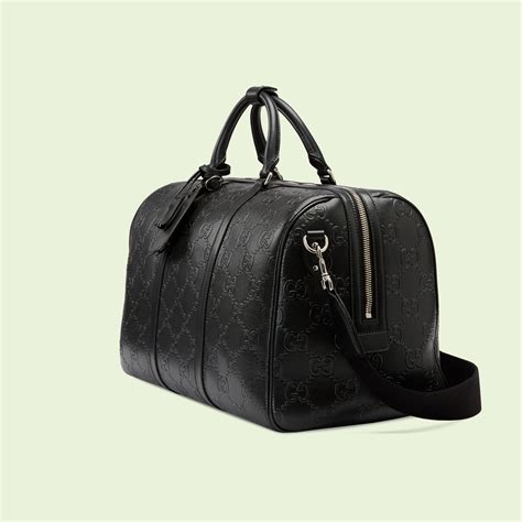 bolsa de viaje gucci